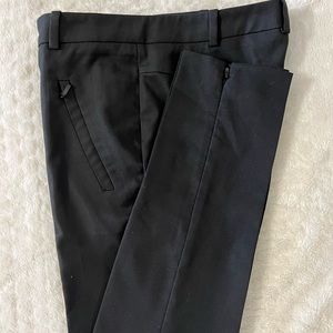 Black trouser with elastic waistband and zipper at side seam